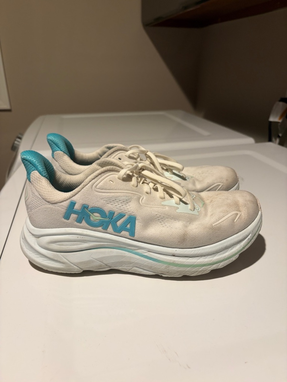 Hoka Off-White and Teal Cushioned Running Shoes